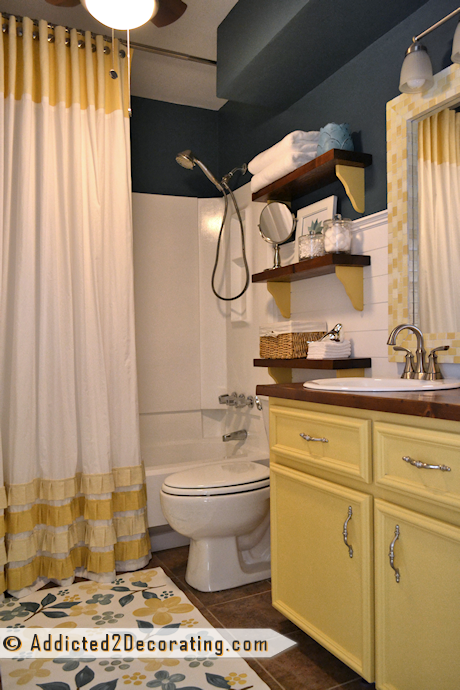 I have the same blue in my bathroom-but I never thought yellow would look so goo