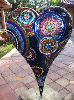 Incredible mosaic heart, nearly 5′ tall, by Sue Ferrante. The work in progress p