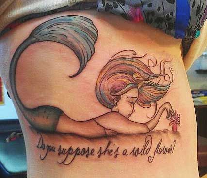 mermaid tattoo maybe holding a heart? Love the rainbow hair! NO ARIEL!! Cute NOT
