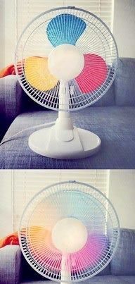 Paint primary colors on fan blades to make a rainbow fan