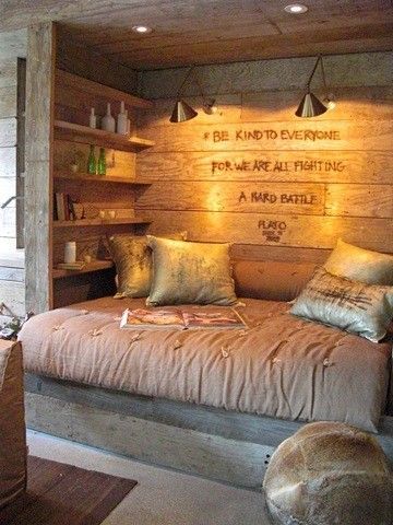 Reading nook made from reclaimed wood. So cozy!