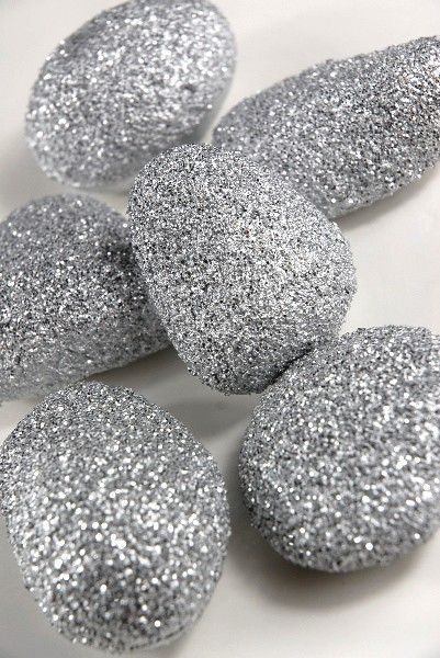 super inexpensive for centerpieces! – paint rocks with glue and sprinkle with wh