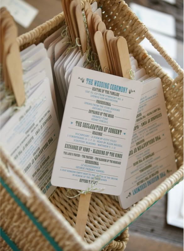 the wedding ceremony programs on fans…like this for our outdoor wedding!