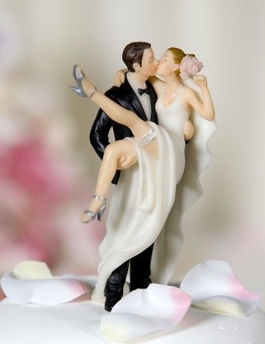 This website has sooo many cool wedding cake toppers! to look at later