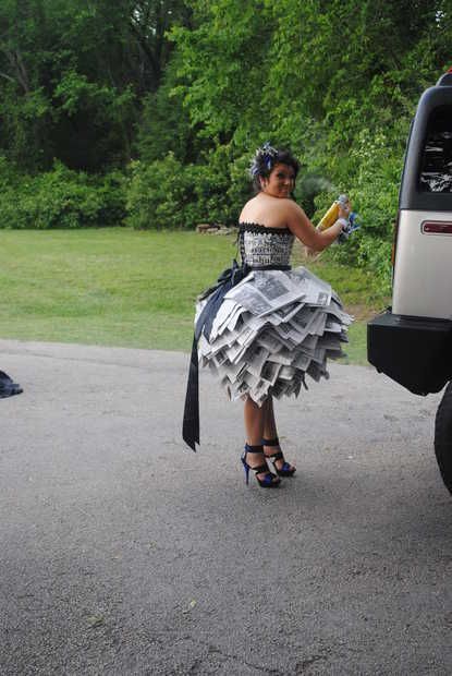 You need to be creative sometimes, and a dress out of newspaper is definitely cr