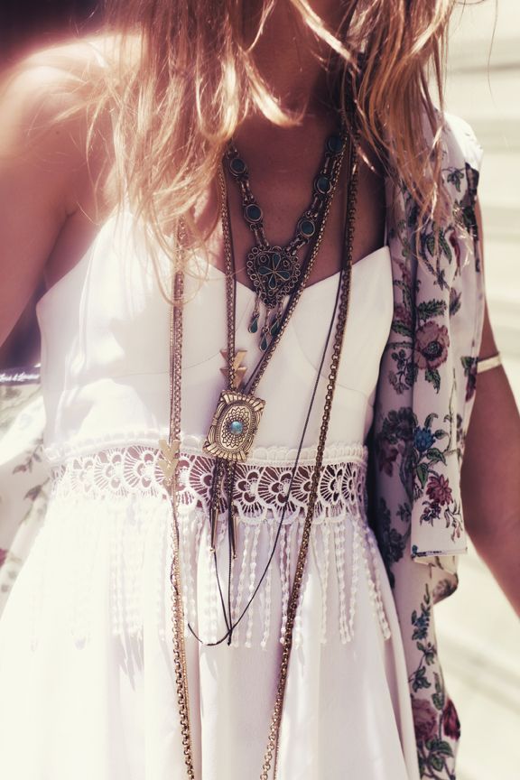 Feminine boho lace fringe dress with modern hippie fashion layered necklaces for