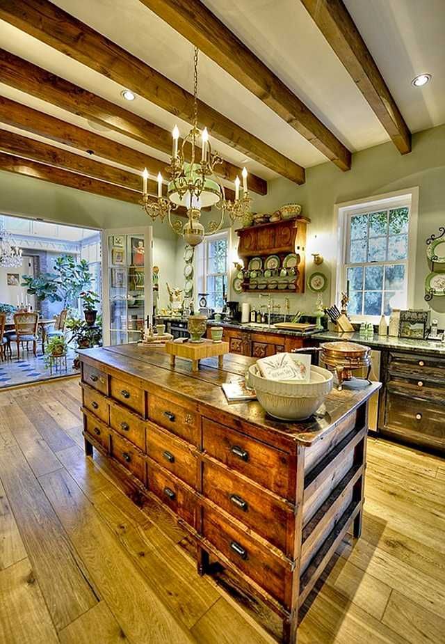I love this entire kitchen, but this island full of drawers (knock off antique?)
