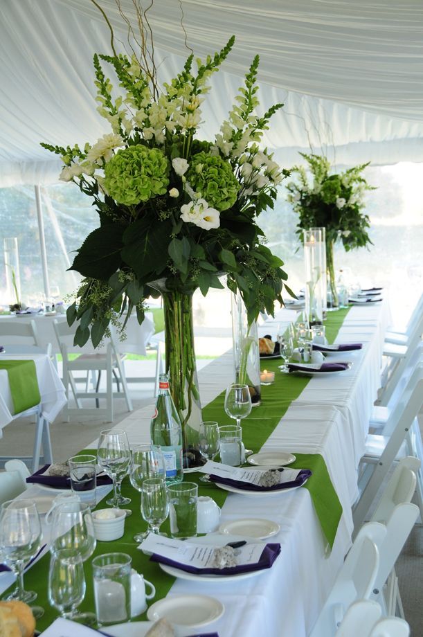 #green country wedding with tall, green wedding reception table centerpieces…