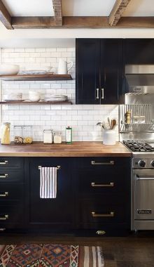 Love 3 things: butcher block counter tops, white subway tile, and floating shelv