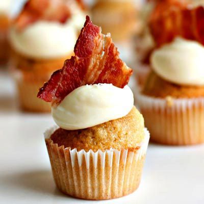 Maple Bacon Cupcakes featuring a maple cinnamon cupcake, vanilla frosting, and a