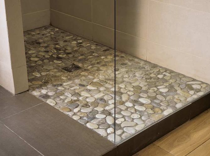 Stunning pebbles for the floor.  I want this in my shower…