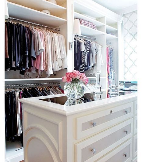 Another dream closet- love the color coordinated system and the tall mirror topp