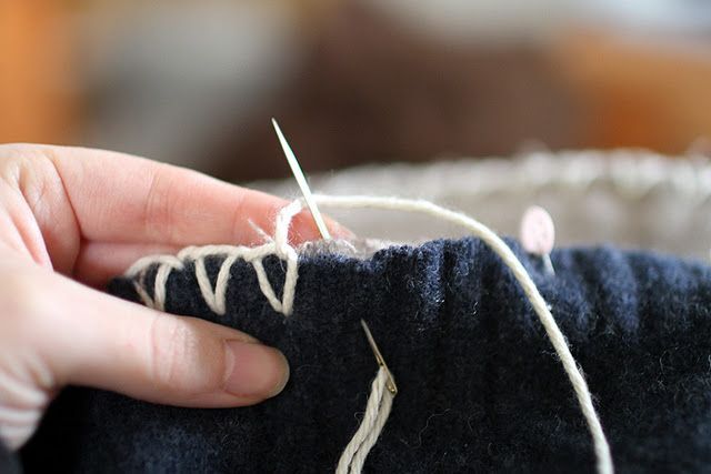 closed blanket stitch on a re-purposed sweater blanket