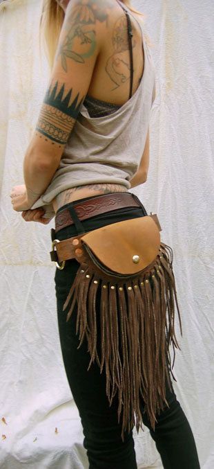 Start with ANY old fanny pack. Add fringe and beads, patches, old jewelry etc…
