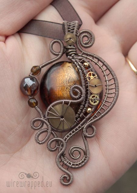 Victorian styled Steampunk pendant with polished glass, wire wrapping and watch