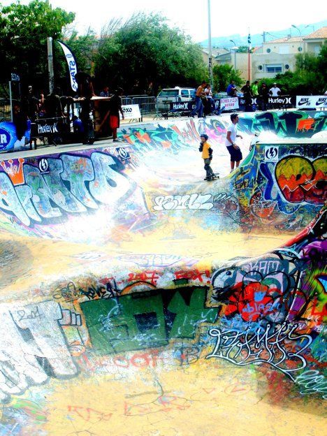 An urban skatepark covered in graffiti art work, Marseilles skate park is both b