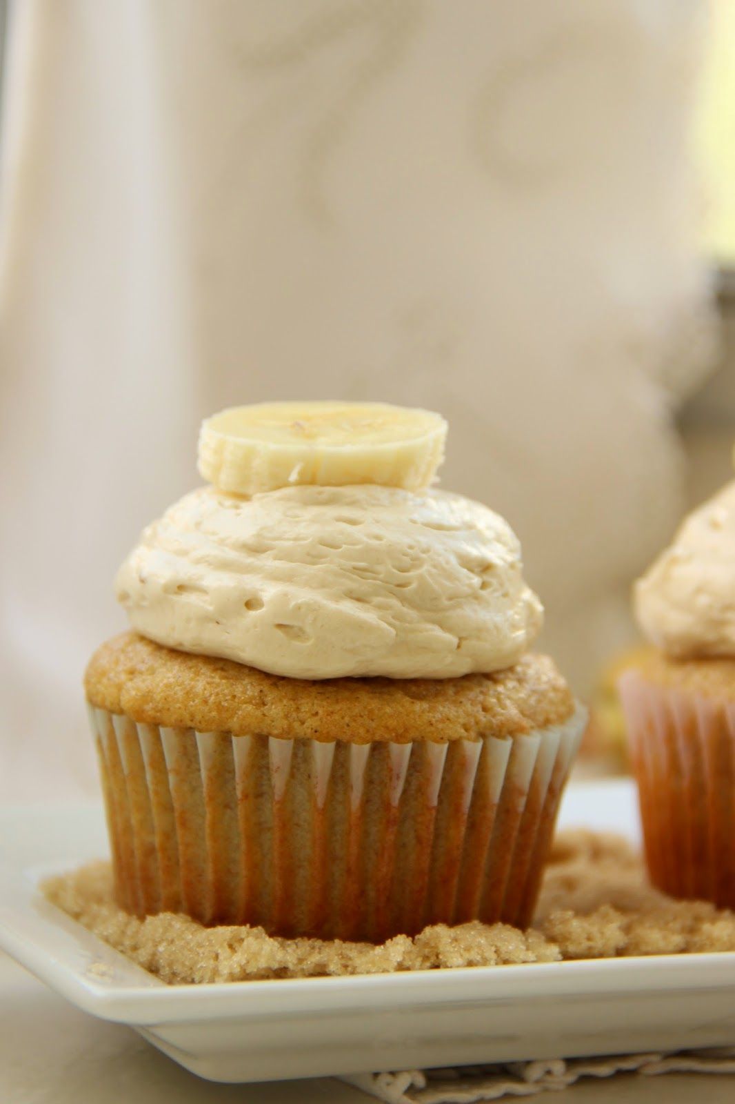 Banana Cupcakes with a Whipped Brown Sugar Buttercream. You HAVE to try this fro