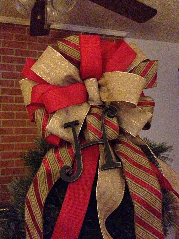Christmas tree topper bow with -monogram got to find me someone to make a bow fo