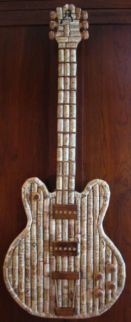cork guitar – make anything out of corks! Draw a template on butcher paper and u