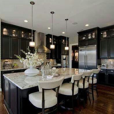 How elegant is this kitchen? BUT the island is still very inviting… sit down a