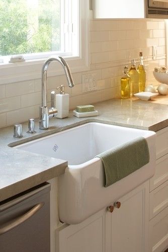 Limestone kitchen countertops in a kitchen. YES you CAN! Love them here with whi