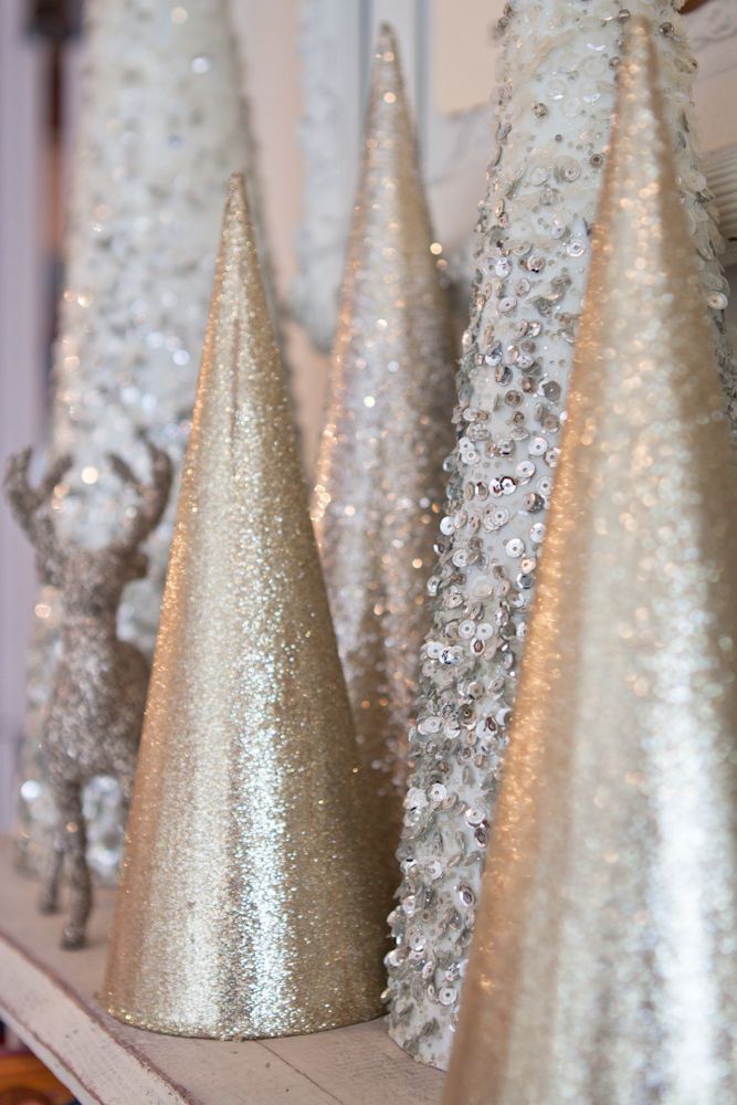 Pretty collection of sparkly trees – so festive for a winter mantel display!