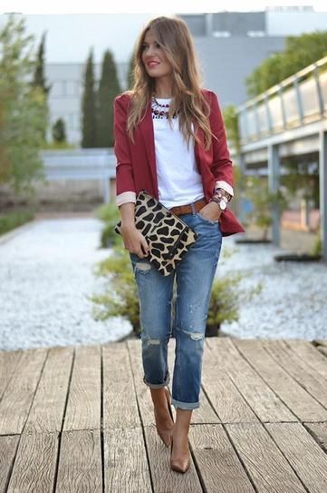 Ripped jeans, chic blazer, statement necklace, + a BOLD envelope clutch = Classi