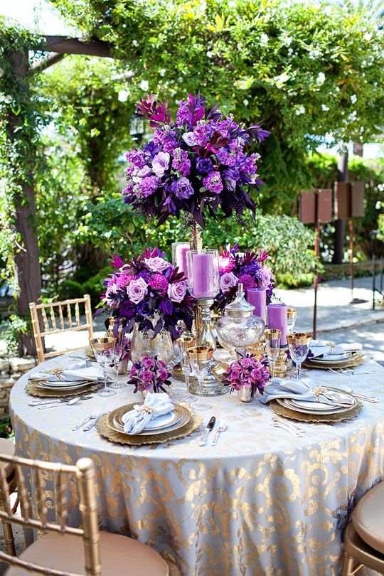 this but with babys breath for big centerpiece and pink roses with cream colors