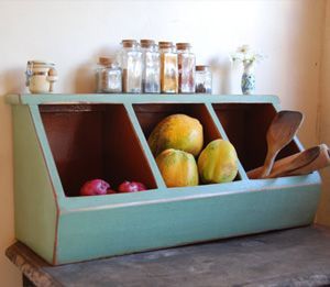 What an adorable and old school way to store fruits and veggies on the counter!