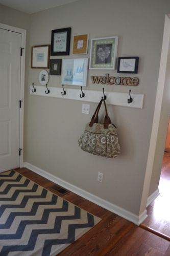 Love this entry way with hooks for purse, diaper bag, backpack, etc.