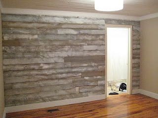 Wood accent wall from 8 and 6 fencing purchased cheaply at Lowes. They brushed e