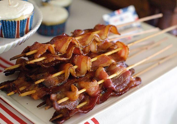 Put bacon on skewer sticks at a bre