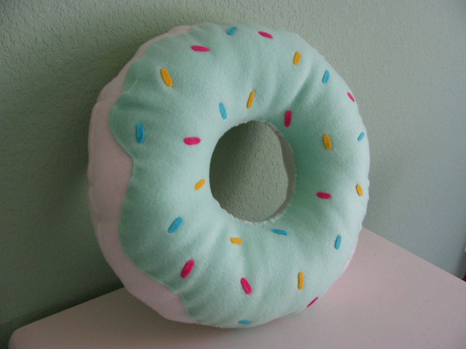 Large Donut Pillow. $20.00, via Ets