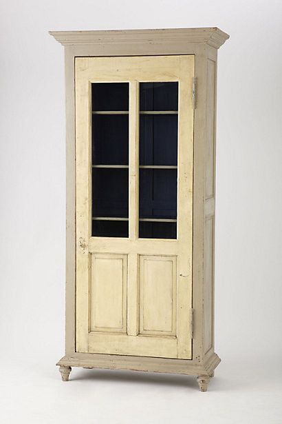 old door repurposed as cabinet door