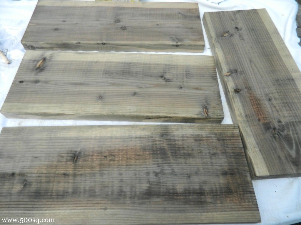 Age new wood to weathered gray “driftwood” look by disolving steel wool in vinegar then using as a