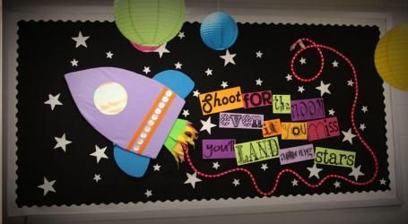 bulletin board: “Shoot for the moon. Even if you miss, you’ll be among the stars