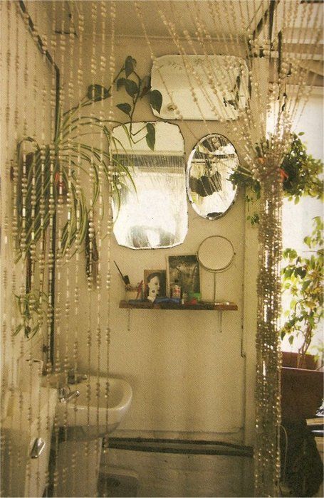 Could hang house plants that like diffused lighting over garden tub in bathroom. Light would reflect off the large mirror, too. Spindles for climbing