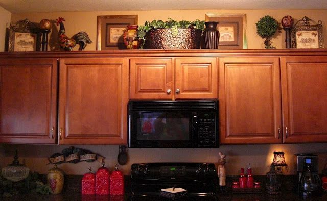 Decorating above cabinets….some ideas…maybe a rooster/wine
