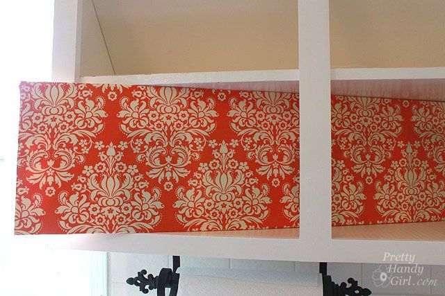 fabric covered foam board for back of cabinets genius!! Makes it easier to switch out when I get sick of