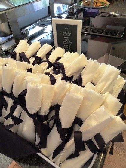 grad party ideas | Graduation party ideas / Utensils rolled in napkins and tied with … purple