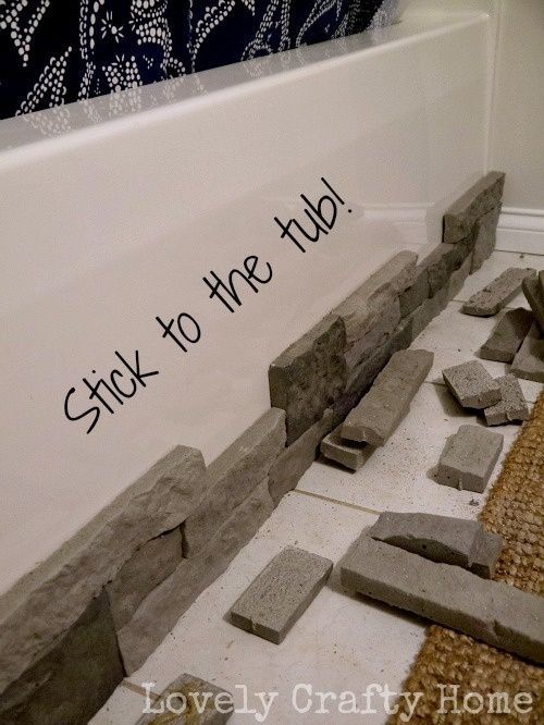 I LOVE THIS! Sticking stones on a tub. @ Home Improvement