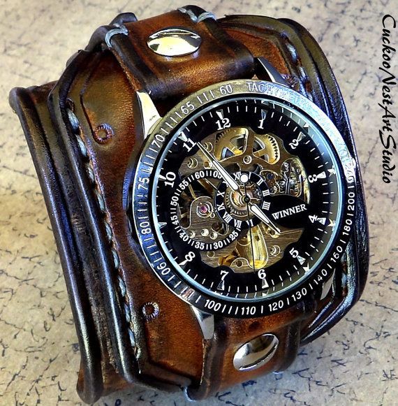 Mens aged brown color watch cuff made with veg tanned leather, completely handmade, hand tooled, hand stitched with natural thread.