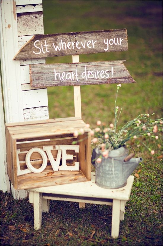 Rustically vintage barn wedding. Love the wood boxes. I like this better than “pick a seat not a