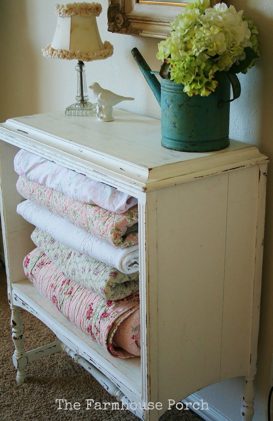 take drawers out… cute dresser turned blanket hutch with vintage quilts