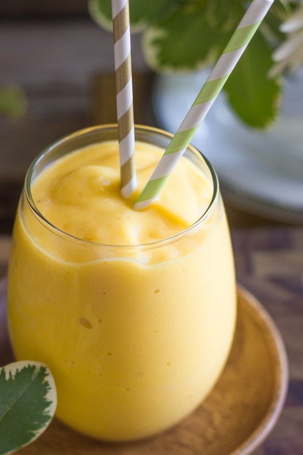 Tropical Sunshine Smoothie – Mangos, pineapple, bananas, orange juice, and a tiny taste of
