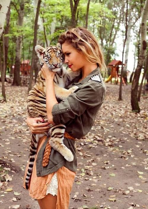ahhh I so wanna hold a baby tiger! Bucketlist for