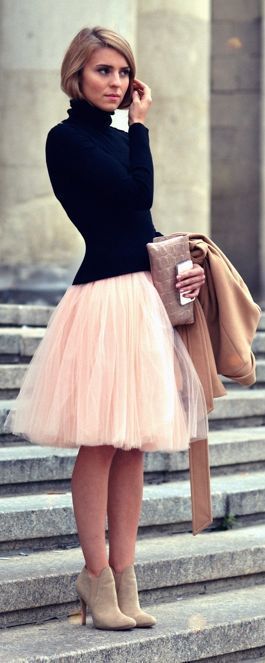 Black sweater, pink tulle skirt, and