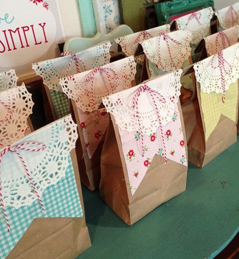 Darling Treat bags.  Doily tops and a great way to use up your piles of scrapbook paper or fabric