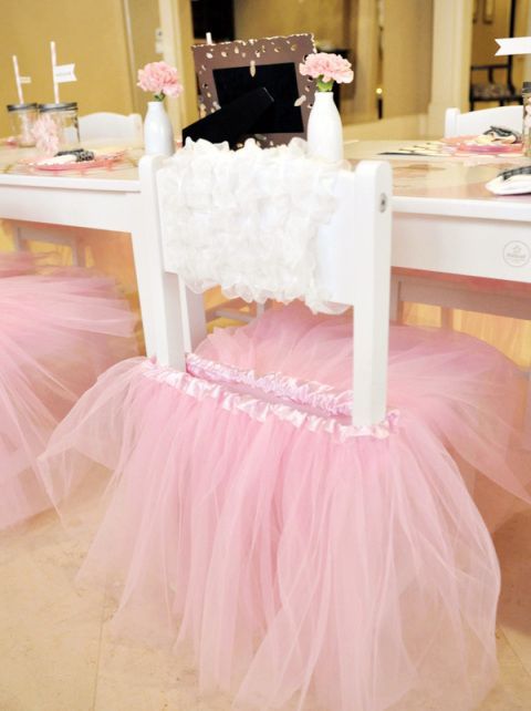 Decorate little girl chairs with tutus. This would be cute for a little girls tea