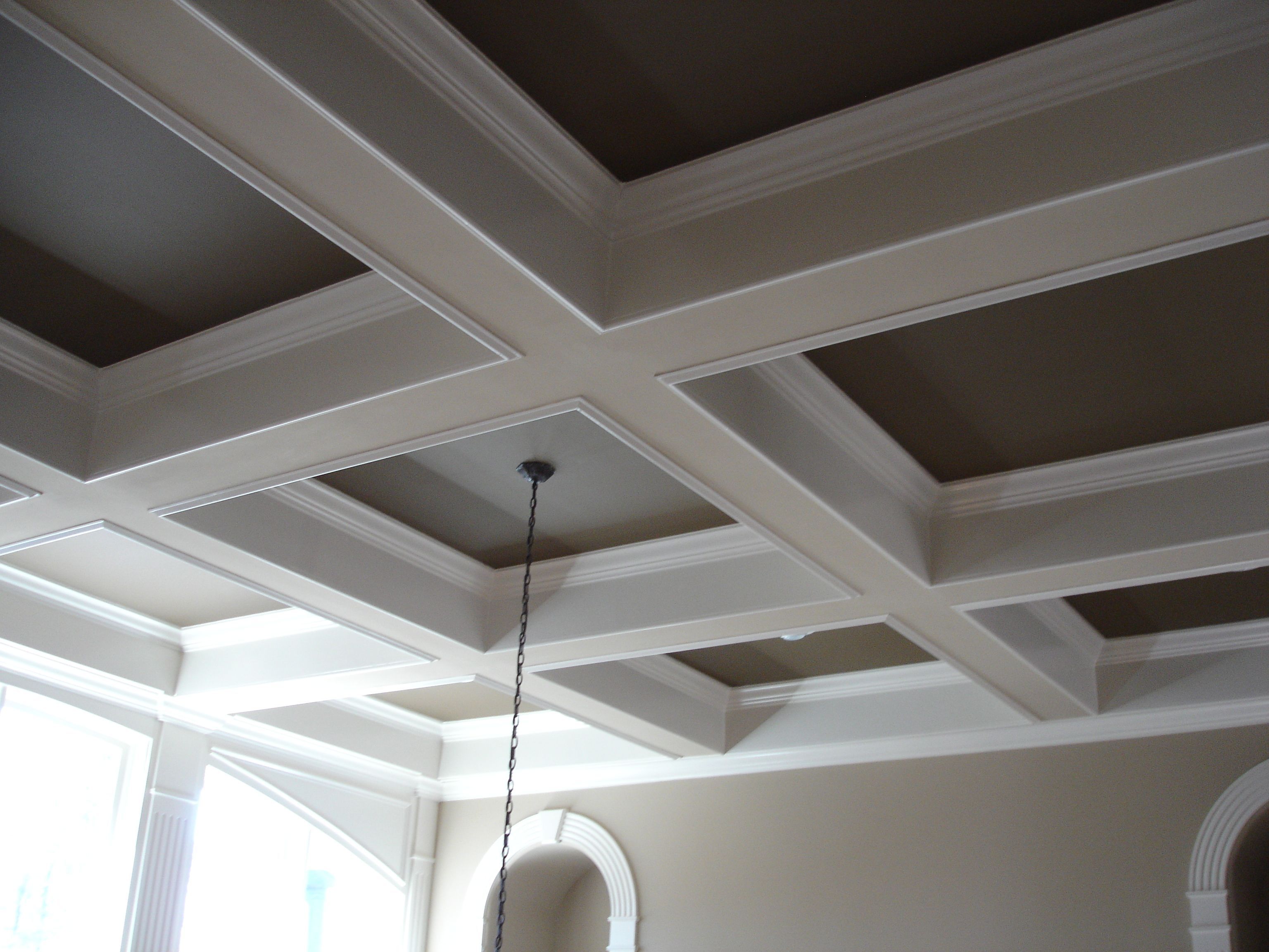 family room with coffered c